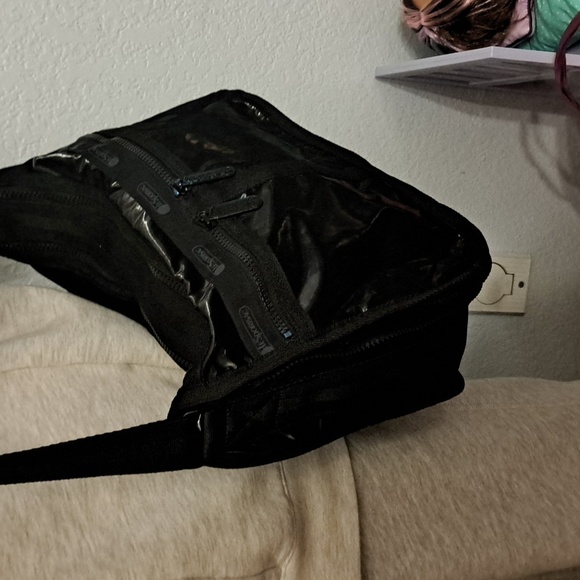 LeSportsac Deluxe Everyday Bag in a black shine or patent finish. - Picture 3 of 13